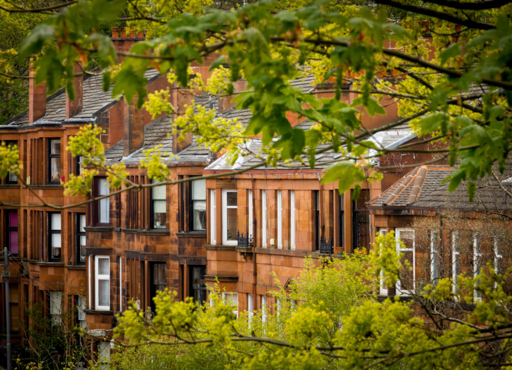 A row of red sandstone tenement flats Southside of Glasgow